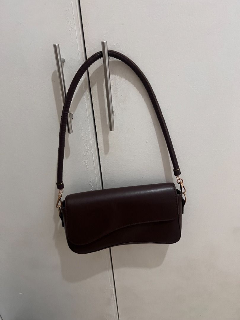 Assymetrical Shoulder Bag (Category: Luxury Bags & Wallets) located in Balanga. Submitted by shopbykk (Listing ID 1461541866, Image 2). Description: Never been used Dark brown color .