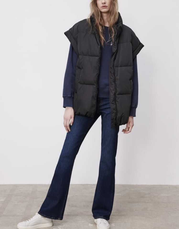 Zara Black Puffer Vest Sleeveless Jacket Oversize (Category: Coats, Jackets and Outerwear) located in Makati City. Submitted by cheapipie (Listing ID 1461413780, Image 1). Description: - Black sleeveless puffer vest - High collar with zip-up front - Padded for warmth and style - Ideal for layering over sweatshirts or hoodies - Perfect for cooler weather - Versatile wardrobe addition.