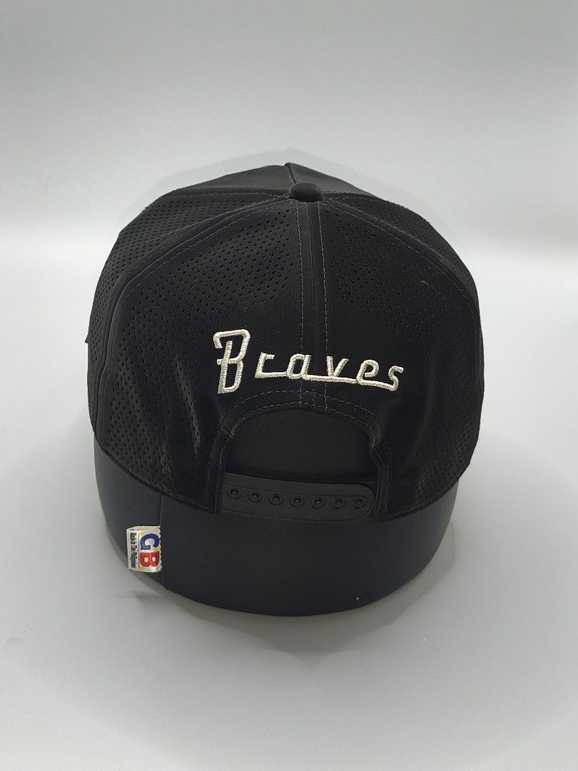 Atlanta Braves Black Snapback Rope Hat (Category: Caps & Hats) located in Baguio. Submitted by vongacayan.vongacayan (Listing ID 1461429672, Image 3). Description: - Black Atlanta Braves snapback hat - Features iconic Braves logo on the front - 'Braves' embroidered on the back - Stylish rope detail across the brim - Perforated sides for enhanced breathability - Adjustable snapback closure for a custom fit - Perfect for any dedicated Braves fan.