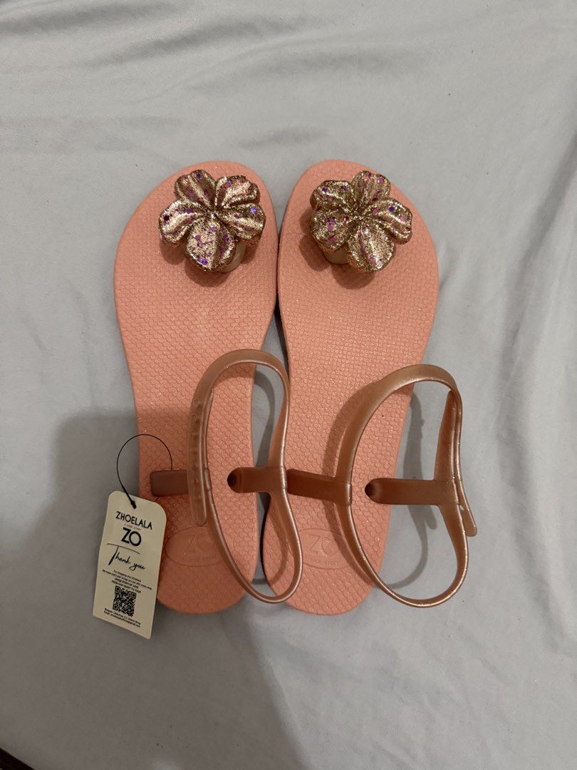 Auth Zhoelala from BKK (Category: Slippers and slides) located in Cebu City. Submitted by shopnsave2015 (Listing ID 1461483264, Image 1). Description: Size 39 Super comfy sa paa.