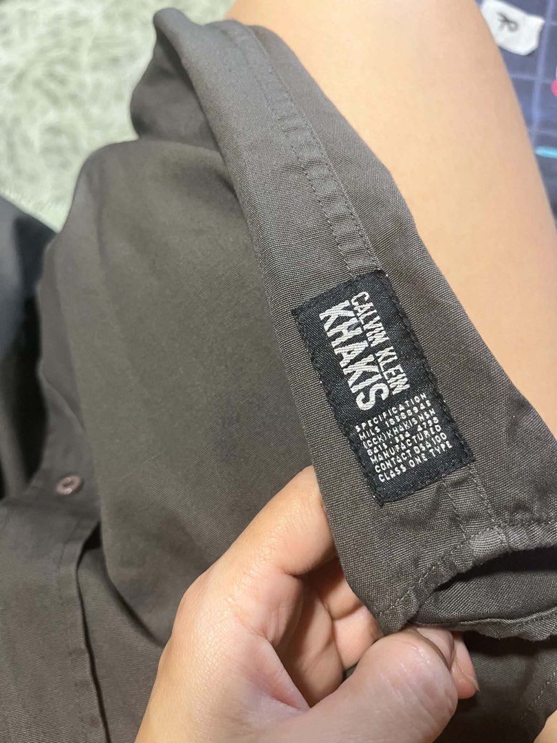 Authentic calvin klein polo shirt (Category: Coats, Jackets and Outerwear) located in Caloocan City. Submitted by trebdy01 (Listing ID 1461332738, Image 3). Description: Like new.