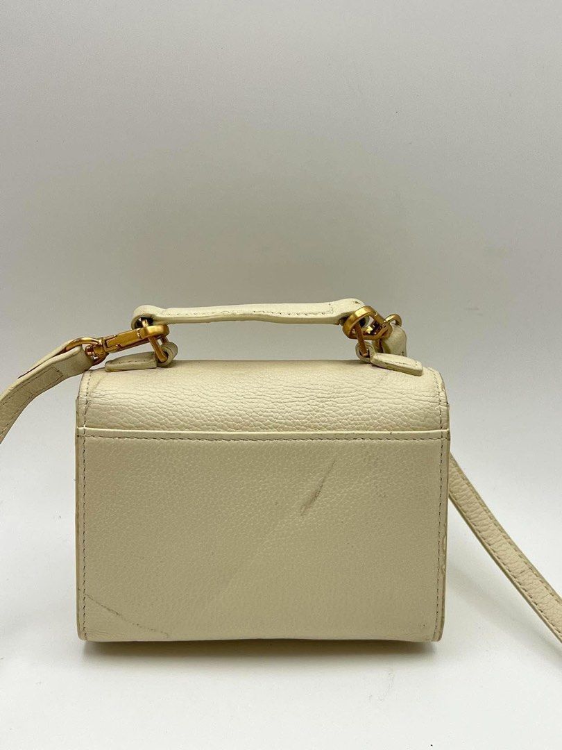 Authentic Courrone nano wallet sling (Category: Wallets & Card holders) located in Cagayan de Oro. Submitted by borse_de_amore (Listing ID 1461370506, Image 2). Description: Authentic Courrone nano wallet sling Super cute! Wont fit fone po, only cards, lipstick keys lang. has signs of use bawal sa maselan pero overall good pa 🏷️880.