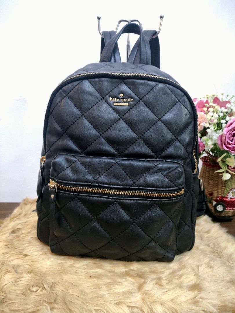 Authentic Kate Spade Emerson Ginnie medium Back Pack (Category: Backpacks) located in Rizal. Submitted by hsiri1128 (Listing ID 1461485537, Image 1). Description: 💯✔️Legit CONDITION : 9/10 ISSUE / FLAWS : None. sti in excellent condition MATERIAL : Genuine soft leather w/ gold hardwares DETAILS : Medium size. fit up to 13" laptop. pwede pang school. very black in actual, no visible rubs/bakbak.