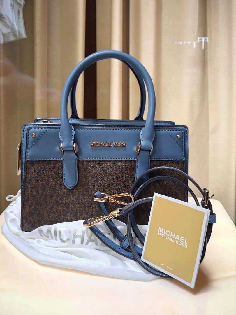 AUTHENTIC MICHAEL KORS MIRREN 2WAY SATCHEL (Category: Cross-body Bags) located in Las Pinas. Submitted by annachiaonair2037 (Listing ID 1461440164, Image 1). Description: AUTHENTIC MICHAEL KORS MIRREN 2WAY SATCHEL FROM JAPAN WITH DUSTBAG AND CARECARD YKK ZIP GENUINE LEATHER H 6.5" L 10" W 4" Disclaimer: I am not affiliated with, associated with, or authorized by any of the brands featured posted. Any mention of brand names, trademarks, or logos i