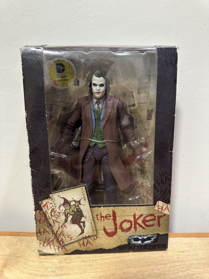 AUTHENTIC NECA The Dark Knight JOKER (Category: Figurines & Statues) located in Malolos. Submitted by joaquinisiah10 (Listing ID 1461478833, Image 1). Description: BIB NECA The Dark Knight JOKER - ₱2000 - guaranteed authentic - complete accessories MOP: GCash SHIPPING: LBC, Lalamove LOCATION: Malolos, Bulacan; UST Manila.