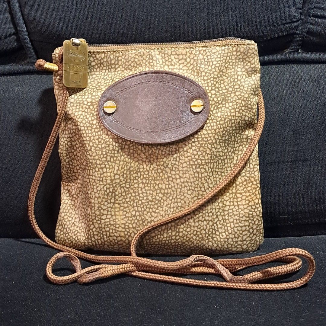 Authentic Vintage Borbonese Redwall Crossbody Bag (Category: Luxury Bags & Wallets) located in Butuan. Submitted by fabchichub (Listing ID 1461344925, Image 1). Description: ✨ Authentic Vintage Borbonese by Redwall Crossbody Bag ✨ Selling this rare, classic piece featuring the iconic "Occhio di Pernice" (partridge eye) textured pattern in brown/tan suede. Made in Italy, this is a premium vintage find perfect for collectors and everyday style. Bra