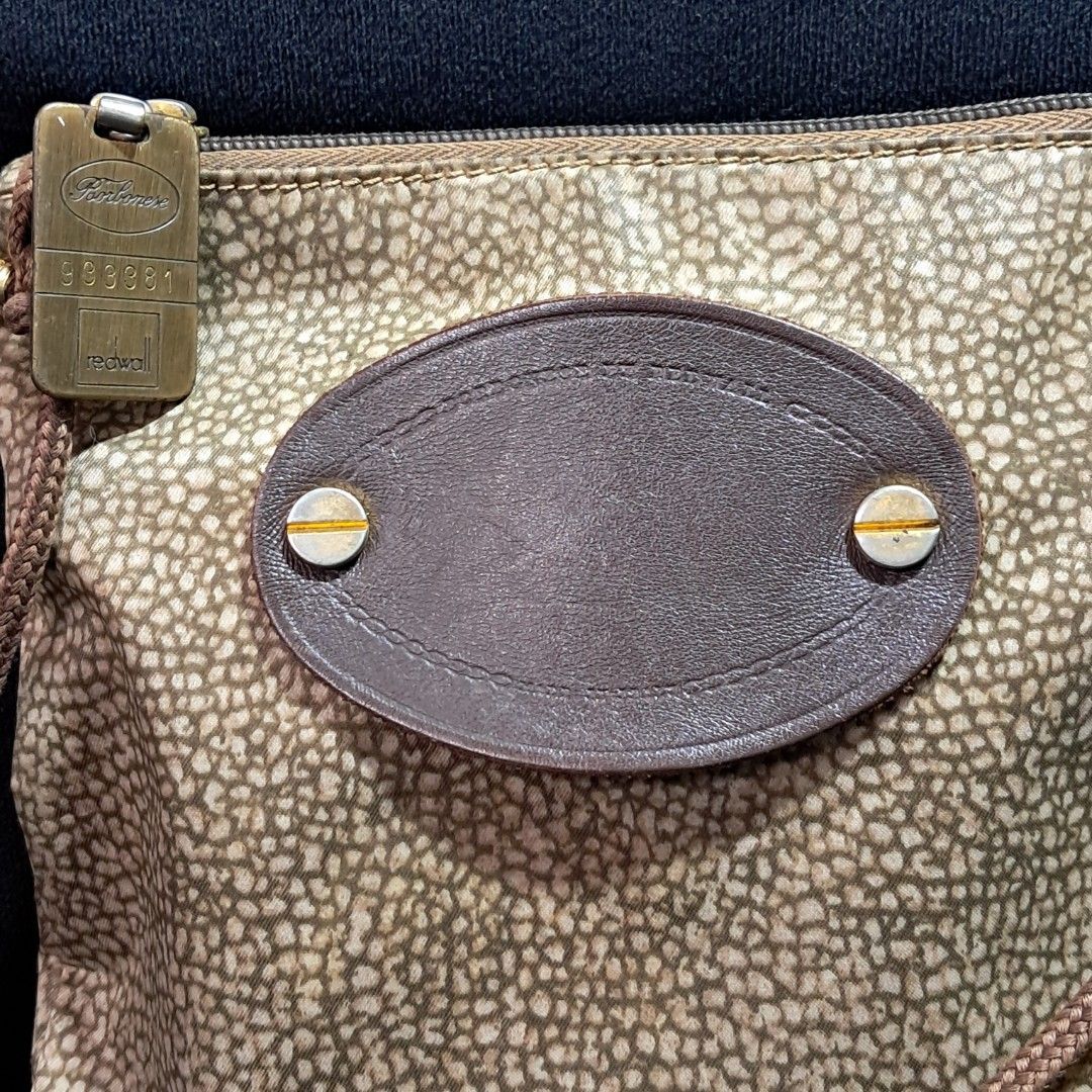 Authentic Vintage Borbonese Redwall Crossbody Bag (Category: Luxury Bags & Wallets) located in Butuan. Submitted by fabchichub (Listing ID 1461344925, Image 2). Description: ✨ Authentic Vintage Borbonese by Redwall Crossbody Bag ✨ Selling this rare, classic piece featuring the iconic "Occhio di Pernice" (partridge eye) textured pattern in brown/tan suede. Made in Italy, this is a premium vintage find perfect for collectors and everyday style. Bra