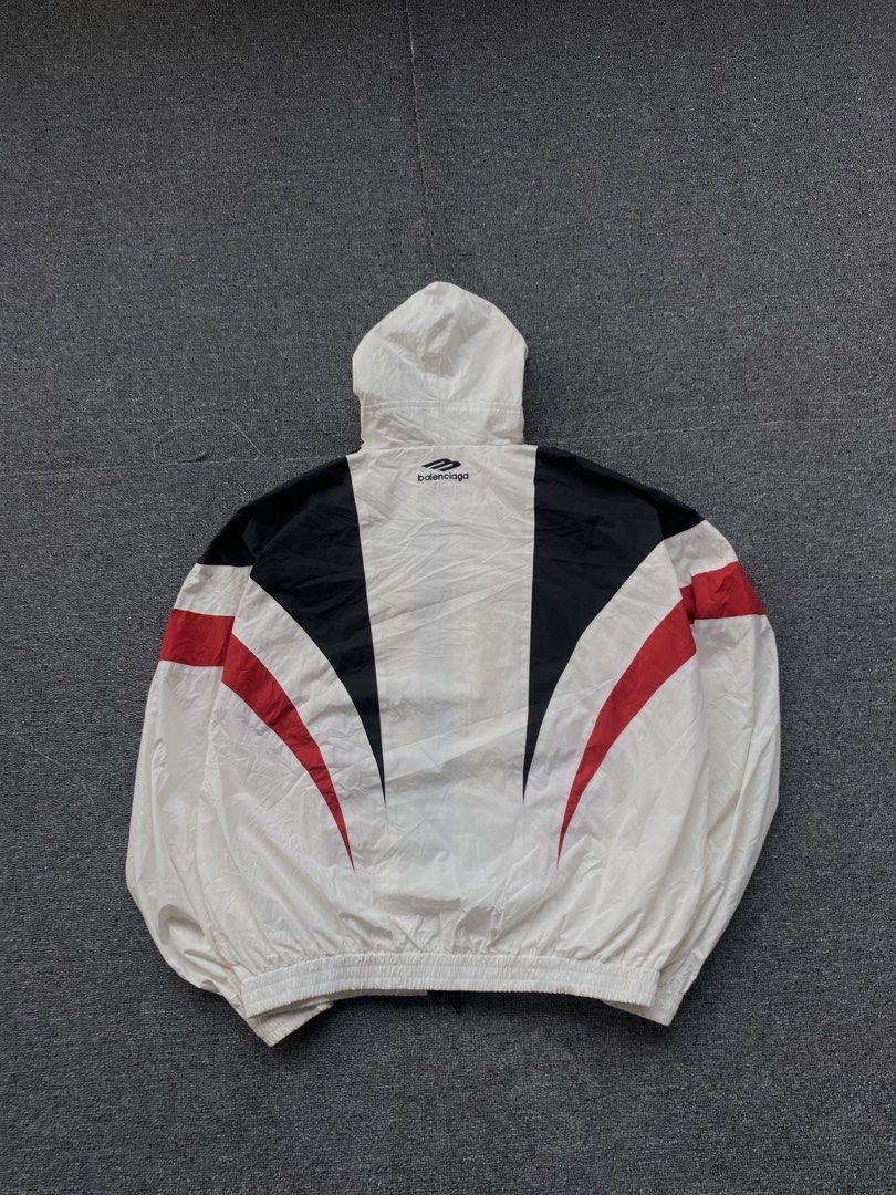 Balenciaga lightweight tracksuit jacket (Category: Coats, Jackets and Outerwear) located in Manila. Submitted by saione (Listing ID 1461334014, Image 2). Description: Balenciaga lightweight tracksuit hooded jacket 26x26 xxxs on tags best fit medium to large 9.5/10 color rate Good condition Issue: Color stain .