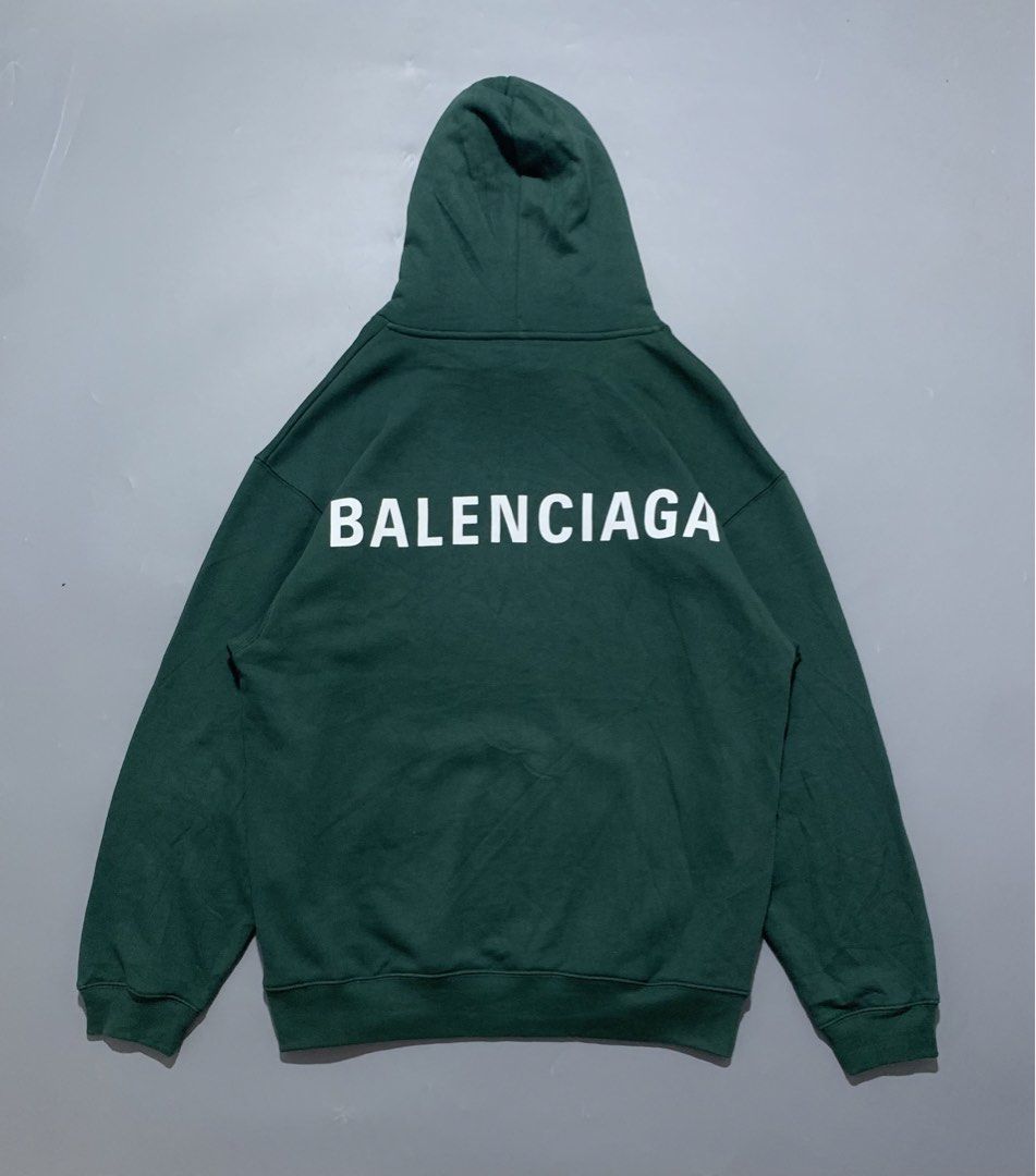 Balenciaga Logo Hoodie (Category: Coats, Jackets and Outerwear) located in Mabalacat. Submitted by thrift_trap (Listing ID 1461545095, Image 1). Description: Dimes: W22 x L28 (Size: S on tag) Condition: Excellent Issue (s): None Color rate: 9.5/10 Complete tags🏷️ Color may vary due lighting‼️.