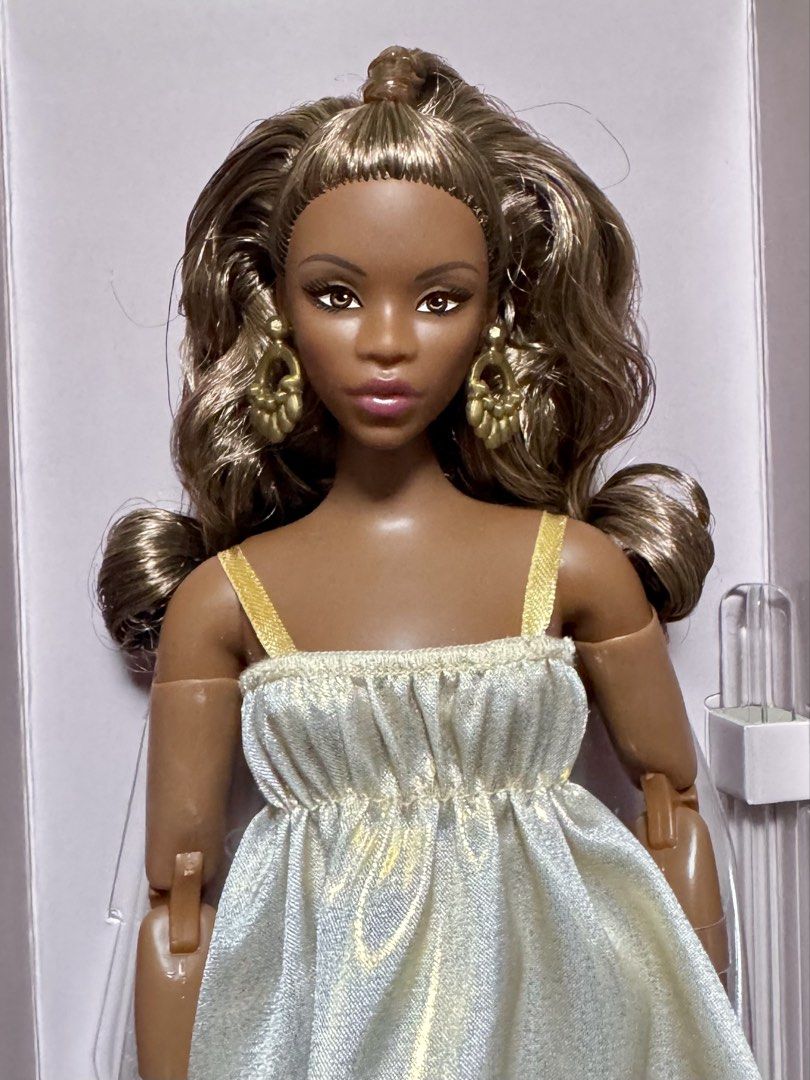Barbie Basics Model 09 Doll For Sale (Category: Kids Toys) located in Pasig City. Submitted by rcdc526 (Listing ID 1461364866, Image 2). Description: - Barbie Basics Model 09 doll - Long, wavy brown hair - Shimmery gold dress with straps - Large gold hoop earrings - Gold heels - Made To Move Curvy body.
