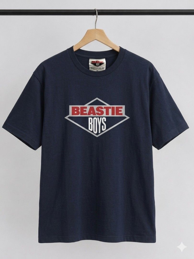 BEASTIE BOYS GRAPHIC TEE (Category: Tshirts & Polo Shirts ) located in Labangan. Submitted by giants_clothing (Listing ID 1461373373, Image 1). Description: Official licensed Beastie Boys graphic tee featuring the classic diamond logo design. Clean navy color with a simple front graphic and plain back, making it easy to style..