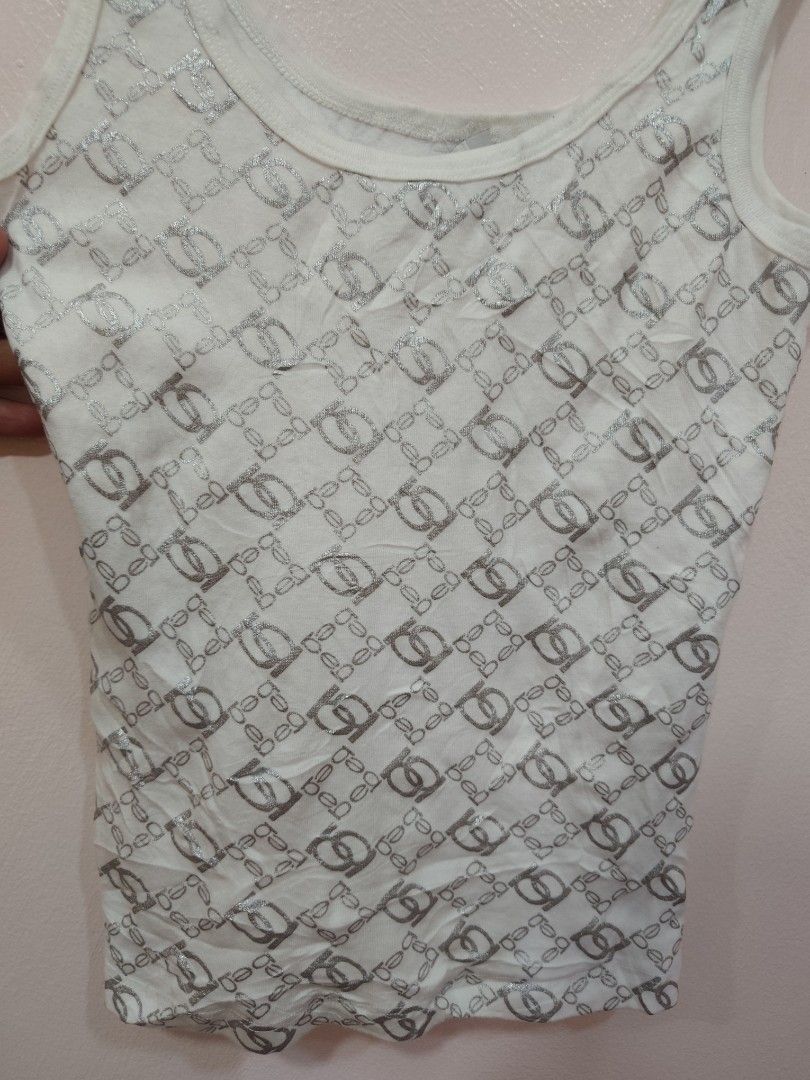 Bebe Tank Tip 🔥 (Category: Sleeveless) located in Tabaco. Submitted by thrifttobecool (Listing ID 1461327939, Image 2). Description: Very Good Condition 💯 9.7/10 Color Rate 💯 1 4.5 Width 📌 21 Length 📌 150 ✅ +sf 📌 Location Bicol ✅.