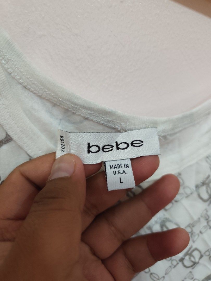 Bebe Tank Tip 🔥 (Category: Sleeveless) located in Tabaco. Submitted by thrifttobecool (Listing ID 1461327939, Image 3). Description: Very Good Condition 💯 9.7/10 Color Rate 💯 1 4.5 Width 📌 21 Length 📌 150 ✅ +sf 📌 Location Bicol ✅.