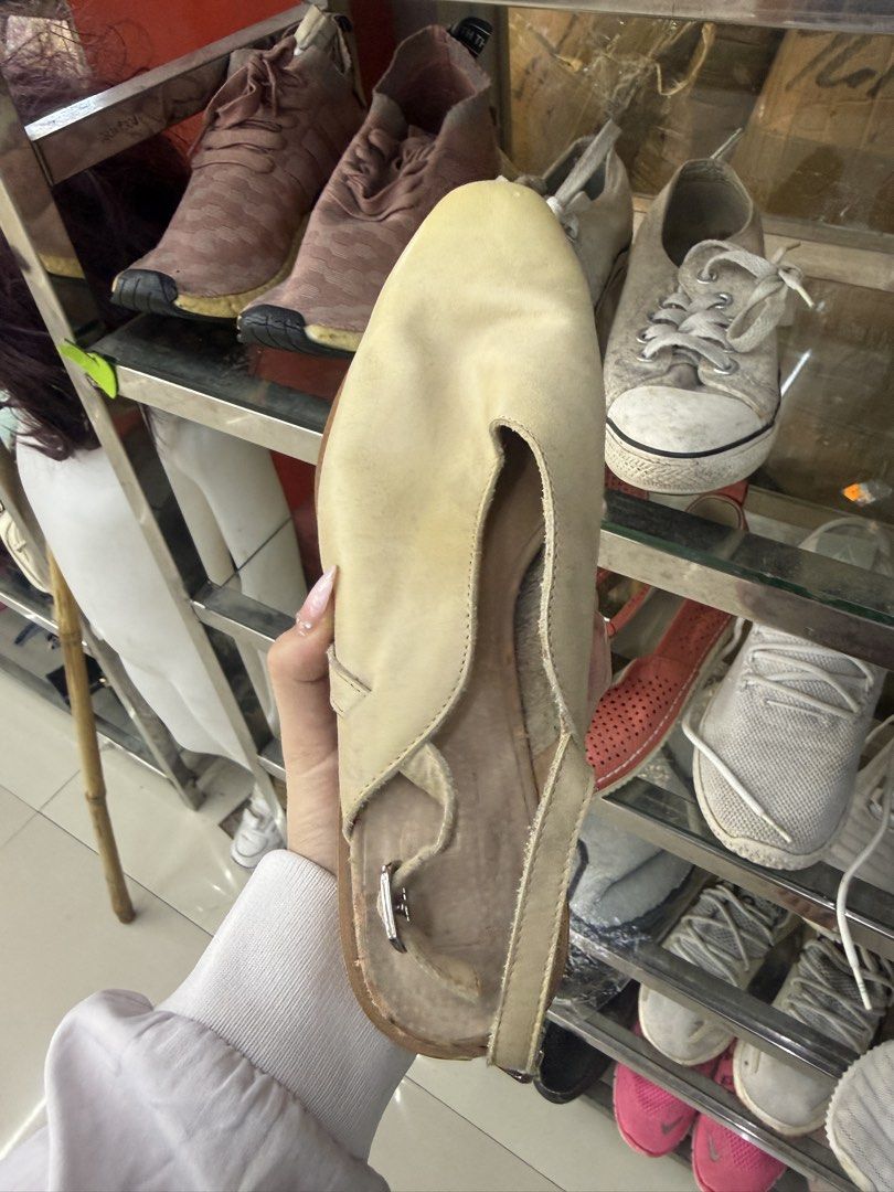 Beige Leather Slingback Wedge Sandals (Category: Flats & Sandals) located in Manila. Submitted by fastlion.584bdf (Listing ID 1461386588, Image 2). Description: - Beige leather slingback sandals - Wooden wedge heel - Unique cutout design on top - Adjustable buckle strap - Comfortable and stylish for everyday wear.