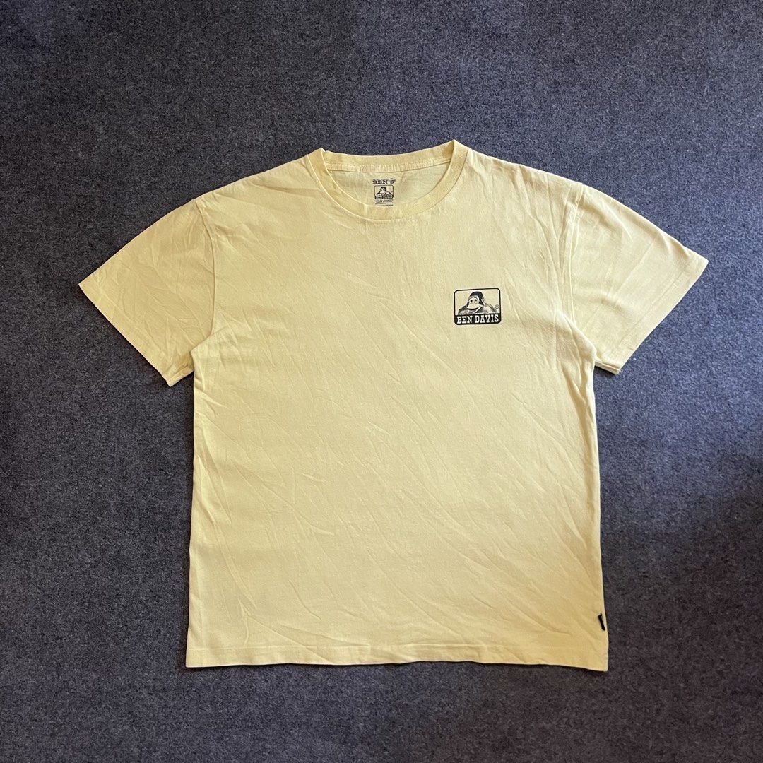 Ben Davis T-shirt Yellow Size Medium (Category: Tshirts & Polo Shirts ) located in Lapu Lapu. Submitted by softfind (Listing ID 1461326664, Image 3). Description: - Ben Davis World Tour T-shirt - Classic Ben Davis logo on front chest - "World Tour" graphic and locations on the back - Tagged size Medium - Ideal for casual outfits Size: Medium Dimes/inch Width: 20 Length: 25 Condition: 9/10 Color rate: 9/10 Issue: none.
