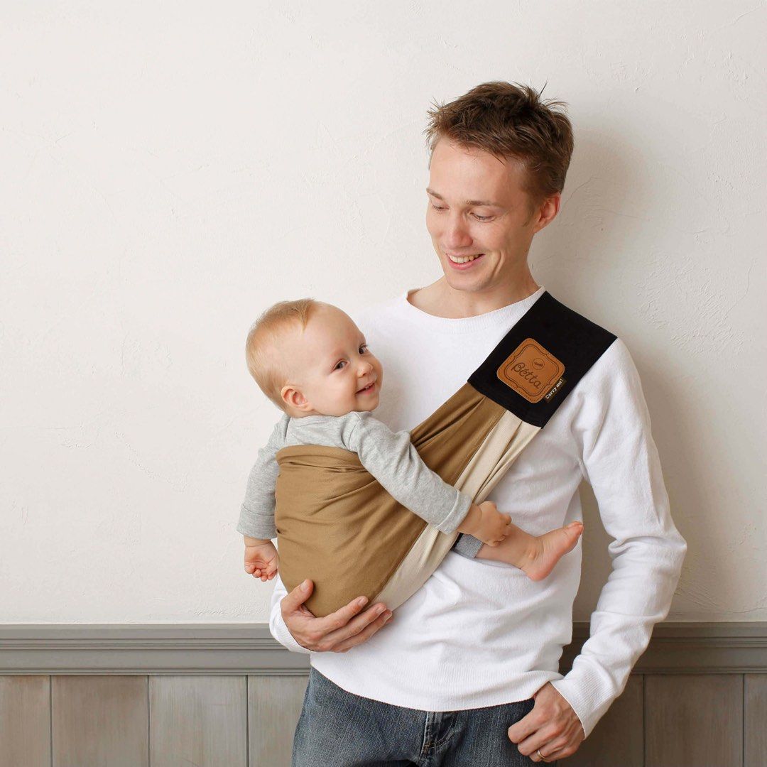 Betta Baby Sling Carrier (Category: Carriers & Slings) located in Calamba. Submitted by rhiajapansurplus-babystuff-03 (Listing ID 1461440767, Image 2). Description: - Betta Baby Sling - Colors: Tan and Cream - Black adjustable shoulder strap - Comfortable and easy to use - Hands-free baby carrying - Suitable for newborns and up.