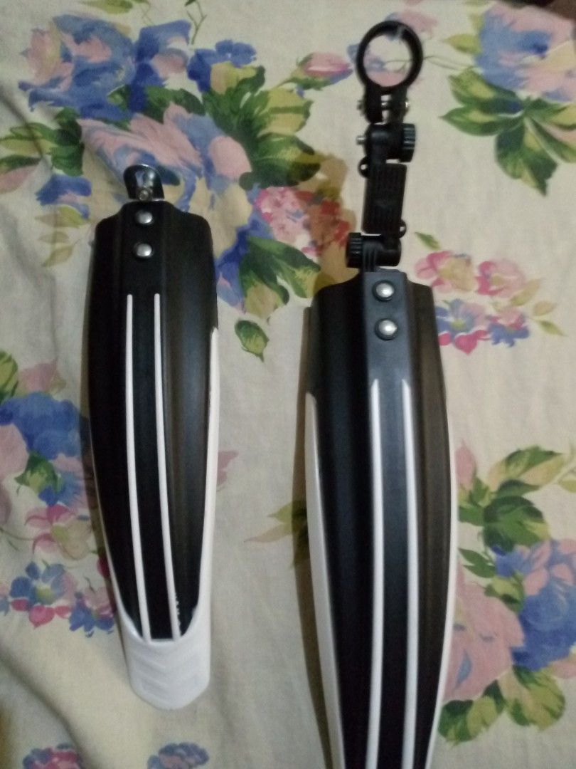 Bicycle Fenders Mudguards Set (Category: Bicycles) located in Manila. Submitted by shopwithrye (Listing ID 1461362591, Image 1). Description: - Set of bicycle fenders - Color: Black with white trim - One fender features an adjustable mount - Keeps you clean from mud and splashes - Universal fit for most bicycles - Simple and easy installation.