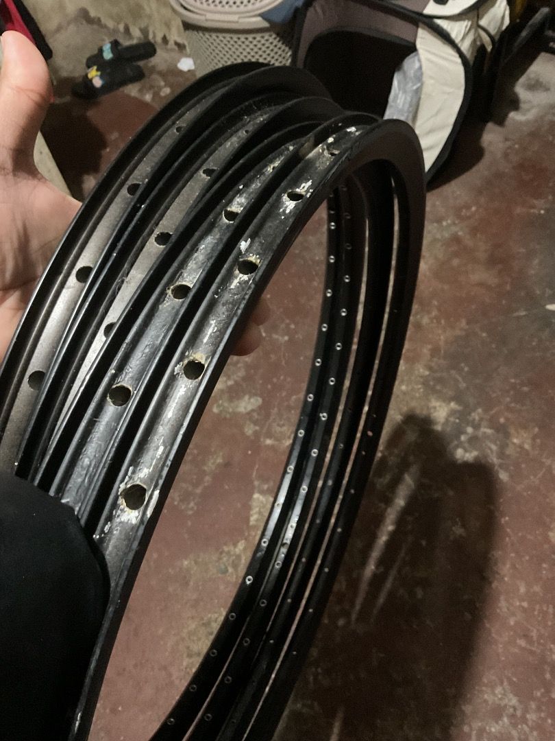 Bike parts (Category: Bicycles) located in Caloocan City. Submitted by carlocaharian32 (Listing ID 1461515523, Image 3). Description: 1. Maxxis Ignitor - Size: H-27.5 W: 2.35 - condition: 75% over 100% (binakbak sa trail at bike-to-work) - 60 psi - tubeless ready 2. MTB Stock rims with eyelet & w/o eyelet - 27.5 inches - 36 holes - Ok pa ang condition 3. DHQ Front Hub - 36 holes - Good condition 4. Spokes - 64pcs - 27.5 1,500 pesos na lahat yan M