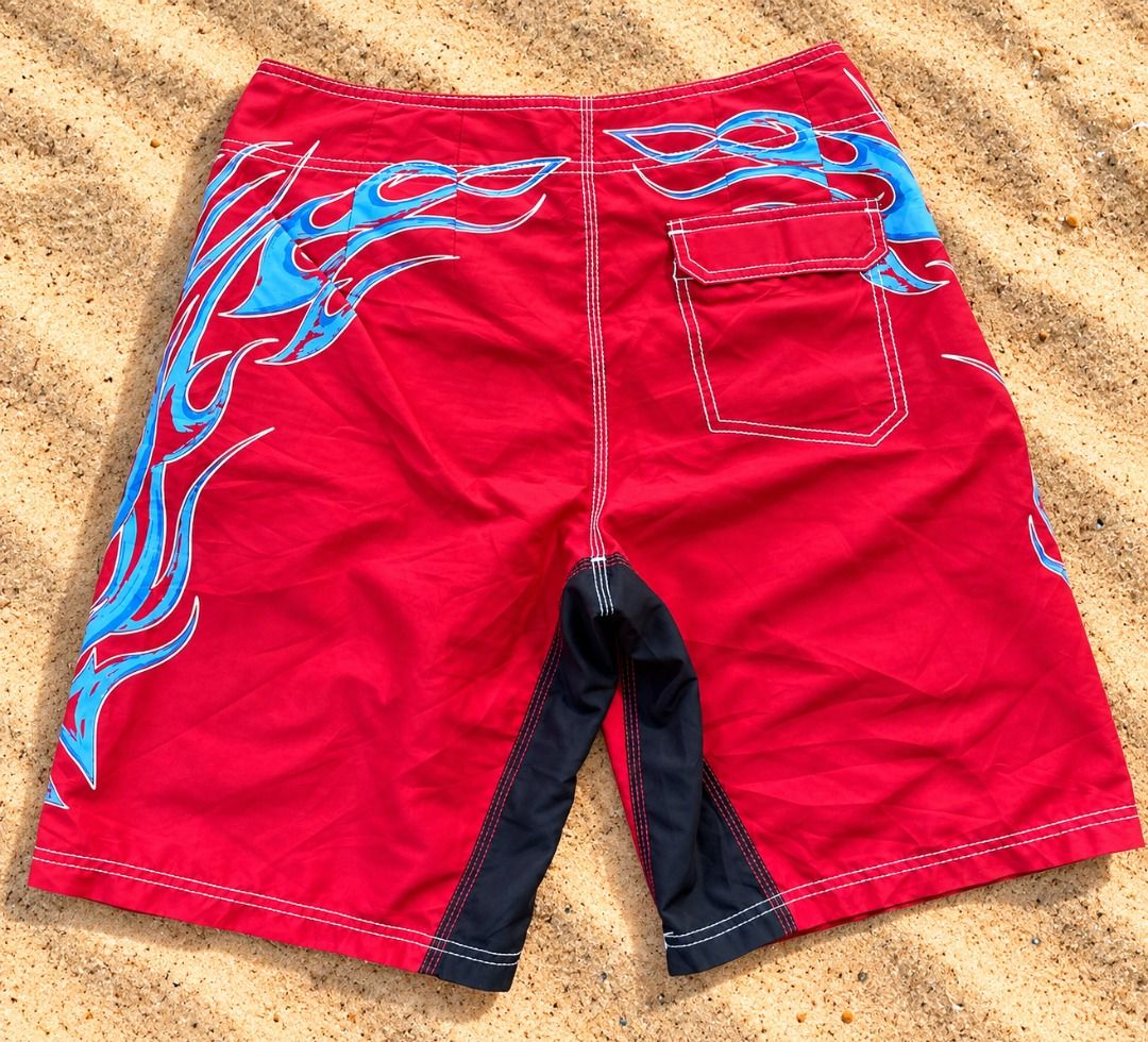 Billabong Red Flame Swim Trunks Size 32 (Category: Swim Trunks & Board Shorts) located in Caloocan City. Submitted by marionthrift (Listing ID 1461445913, Image 2). Description: - Red Billabong swim trunks - Blue flame design - Size 32 - Drawstring waist - Back pocket - Ideal for swimming or lounging - Ready for your next beach adventure!.
