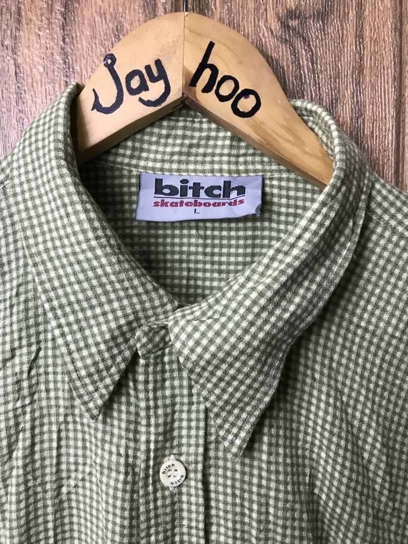 Bitch Skateboards Gingham Button-Up Shirt (Category: Tshirts & Polo Shirts ) located in Aloguinsan. Submitted by jayhooukay (Listing ID 1461474056, Image 3). Description: - 21.5 x 30 - ganda ng fit - Bitch Skateboards green and white gingham button-up shirt - Features the iconic Bitch logo on the chest and hem - Made in Hong Kong - Size L - Ideal for everyday casual wear.
