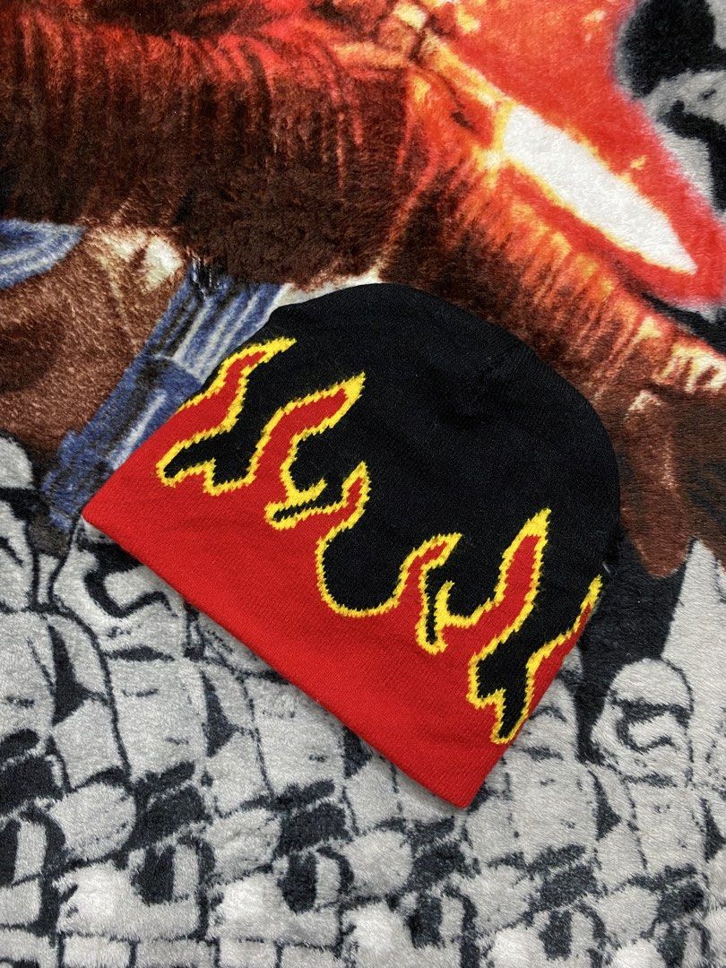 Black and Red flame, Y2K Beanie cap (Category: Beanies) located in Cavite. Submitted by jc_thrift95 (Listing ID 1461527650, Image 1). Description: - Type: Knitted beanie / skull cap - Design: Red lower section with an embroidered or knitted yellow-and-red flame pattern against a black crown - Style: Y2K vintage skater / hip-hop streetwear - Color rate 9/10 (Good as new) - See details picture for dimes..