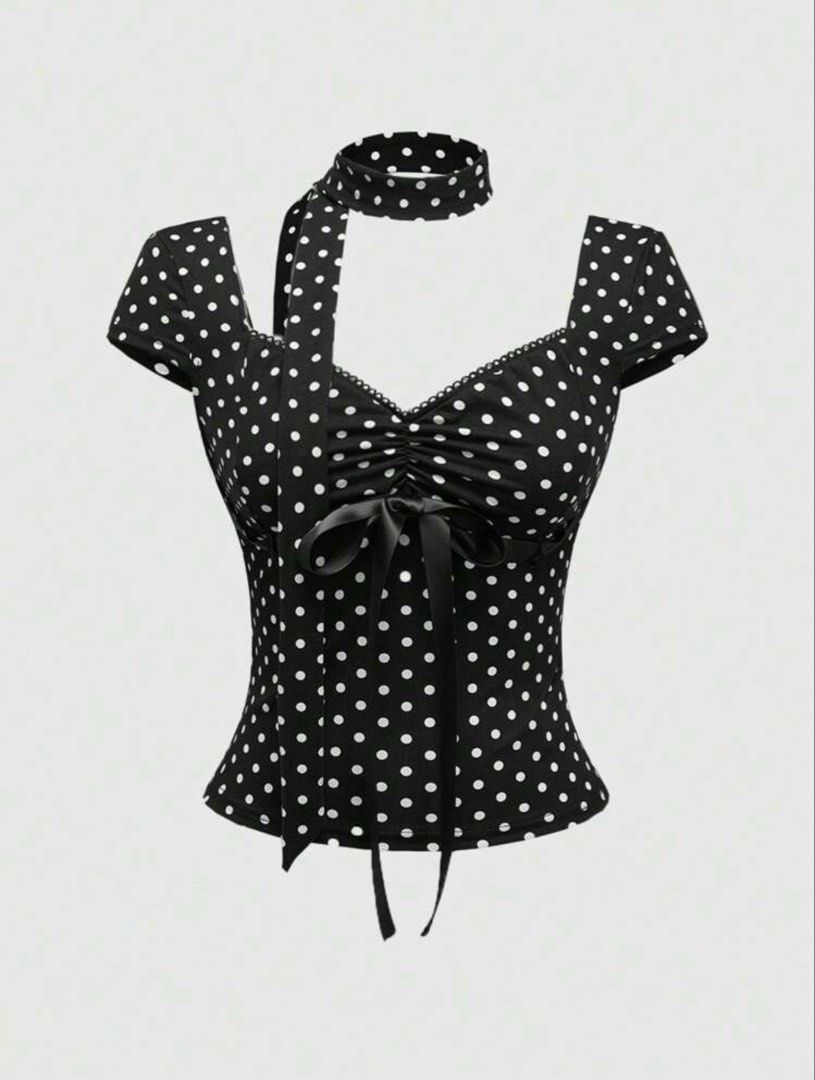 Black and White Polka Dot Top with Choker (Category: Sleeveless) located in Cavite. Submitted by louixxe (Listing ID 1461328425, Image 1). Description: - Adorable black and white polka dot top - Flattering sweetheart neckline with ruching and tie detail - Comes with a matching choker for a complete look - Features cute short cap sleeves - Ideal for achieving a retro or pin-up style.