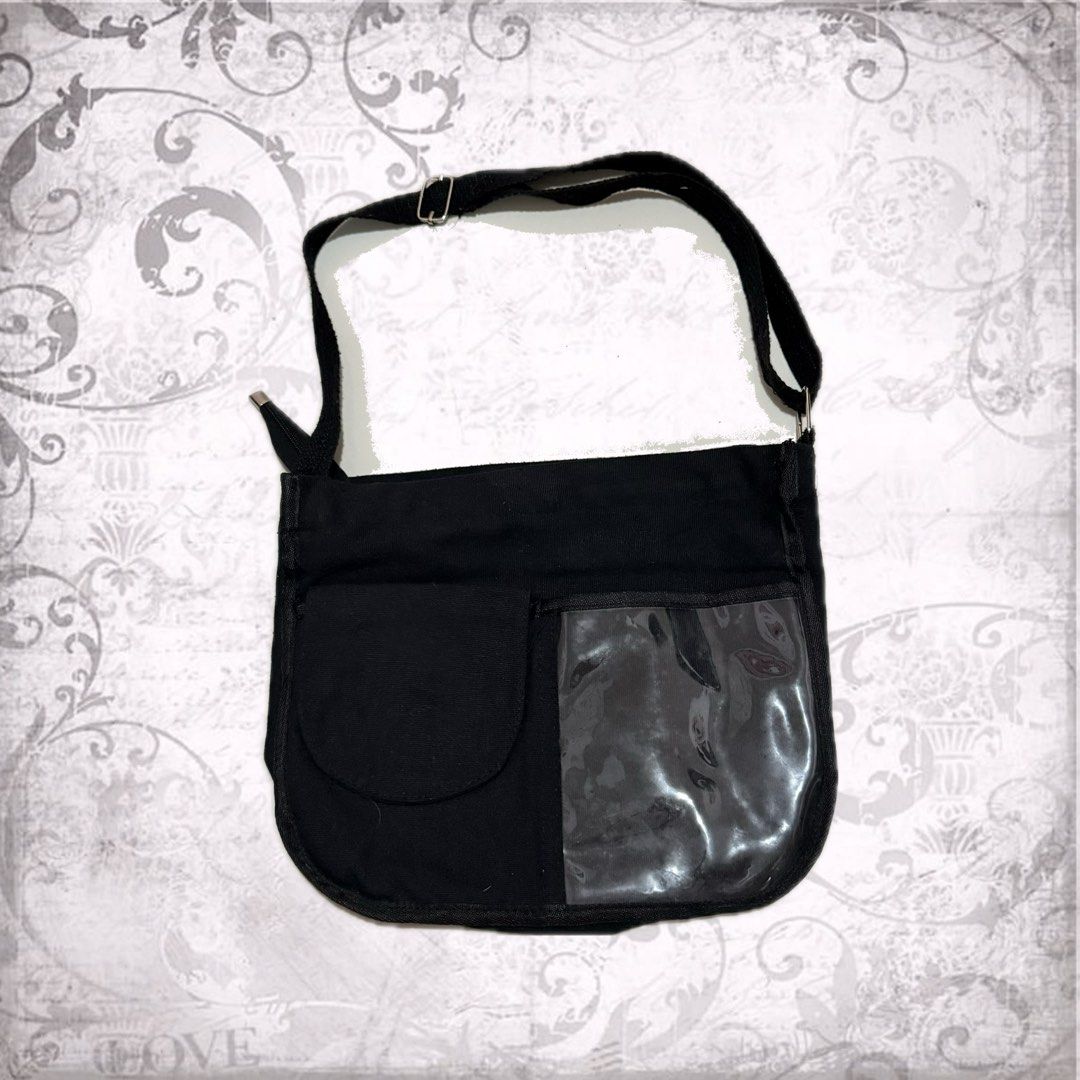 Black bag with transparent pocket (Category: Cross-body Bags) located in Baguio. Submitted by yuridere (Listing ID 1461415334, Image 1). Description: width: 13in length: 11in - Shipping fee shall be covered by buyer ! - MOP: Gcash, Bank Transfer or Cash (for meet up) - Item is newly washed! Can be worn after purchase ^__^ - DM for inquiries & more photo examples !.