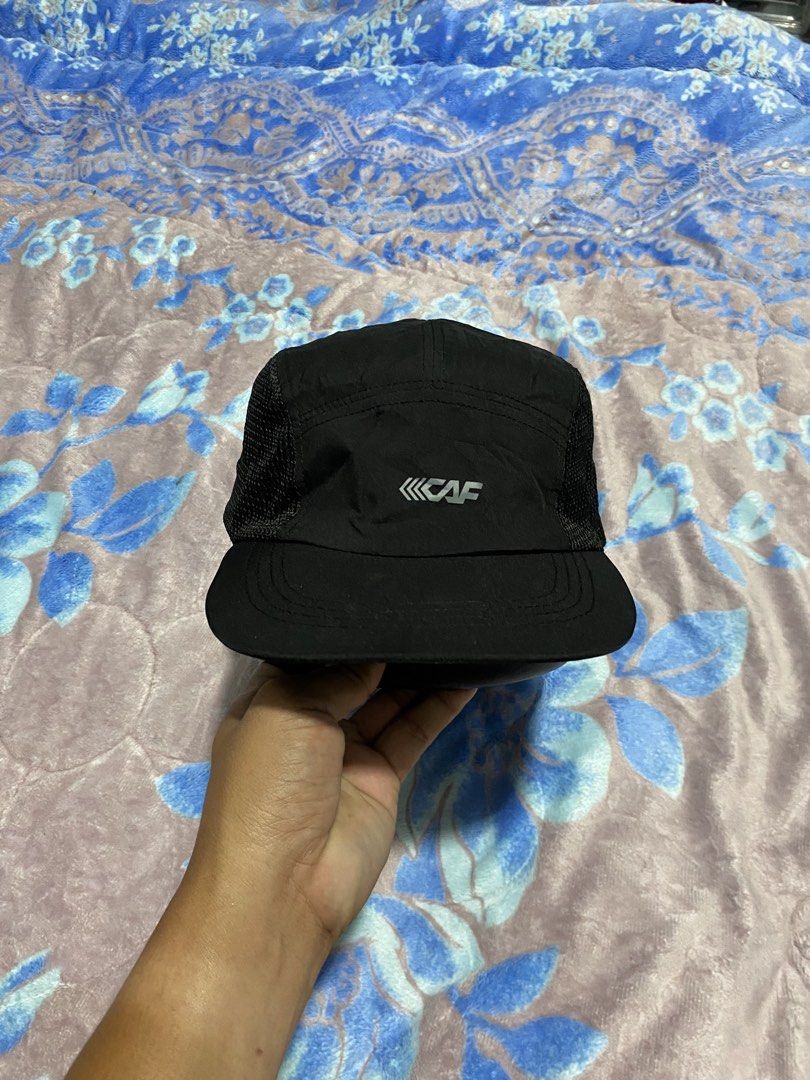 Black CAF Mesh Cap Running (Category: Caps & Hats) located in Polomolok. Submitted by marrssz (Listing ID 1461392984, Image 1). Description: - Stylish black cap with breathable mesh sides - Features the official CAF logo on the front - Adjustable strap for a comfortable, custom fit - Ideal for sunny weather and outdoor activities - Lightweight and designed for maximum breathability.