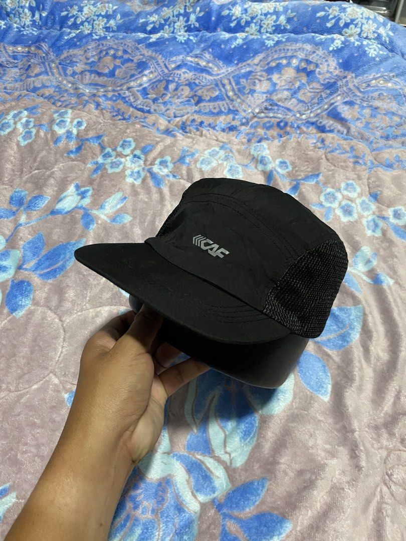 Black CAF Mesh Cap Running (Category: Caps & Hats) located in Polomolok. Submitted by marrssz (Listing ID 1461392984, Image 2). Description: - Stylish black cap with breathable mesh sides - Features the official CAF logo on the front - Adjustable strap for a comfortable, custom fit - Ideal for sunny weather and outdoor activities - Lightweight and designed for maximum breathability.
