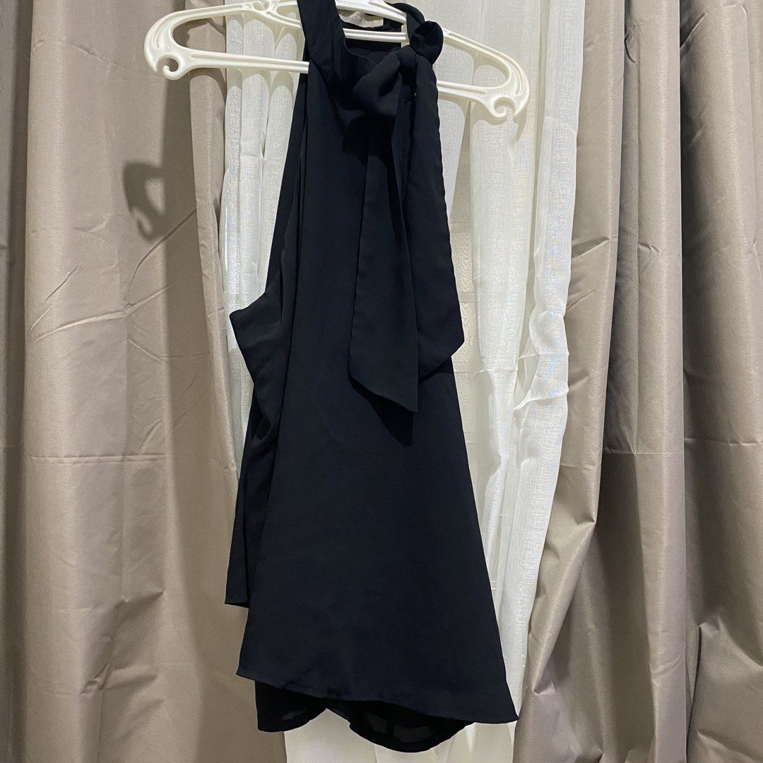 Black classy halter top (Category: Blouses) located in Cebu City. Submitted by stillbound (Listing ID 1461361858, Image 2). Description: size 10 can fit up to Large.