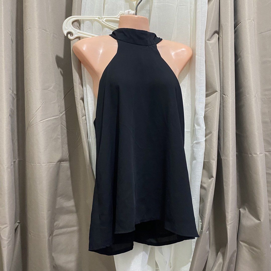 Black classy halter top (Category: Blouses) located in Cebu City. Submitted by stillbound (Listing ID 1461361858, Image 1). Description: size 10 can fit up to Large.