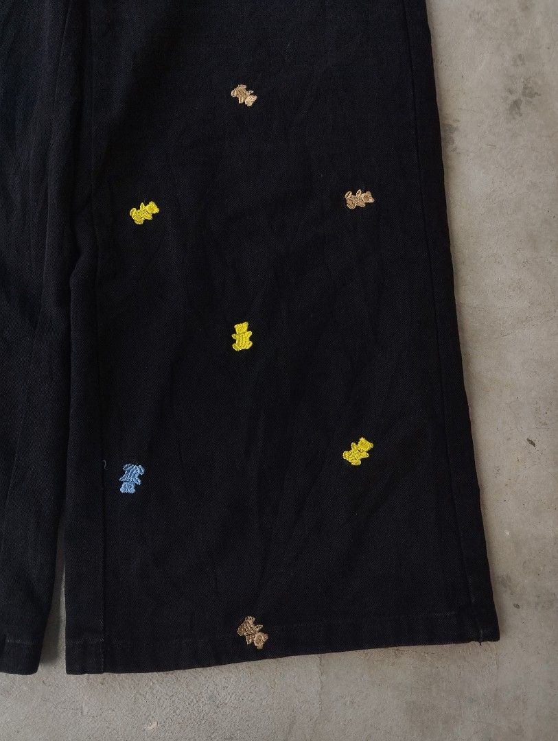 Black Embroidered Bear Wide Leg Pants (Category: Jeans) located in Mati. Submitted by old_era.ph (Listing ID 1461459252, Image 3). Description: - Black wide leg pants - Adorable embroidered bears all over (yellow, blue, brown) - High-waisted style - Estimated size: Medium - Ideal for a casual and cute look.