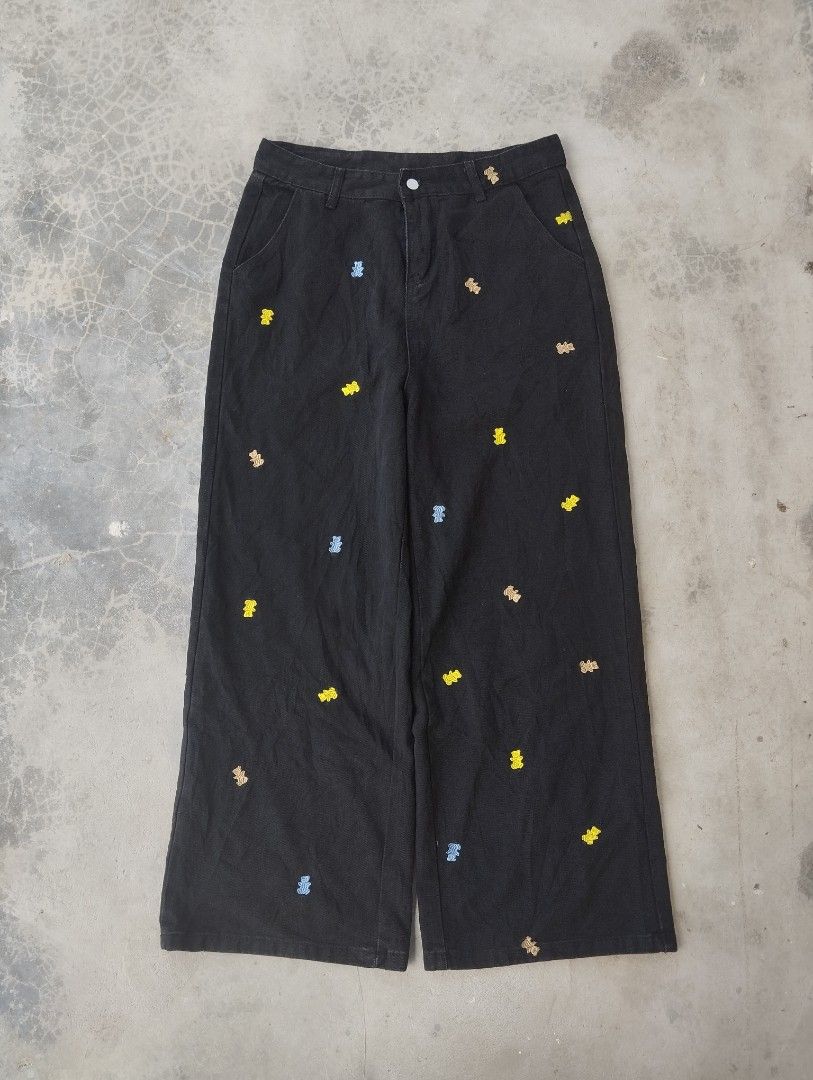 Black Embroidered Bear Wide Leg Pants (Category: Jeans) located in Mati. Submitted by old_era.ph (Listing ID 1461459252, Image 1). Description: - Black wide leg pants - Adorable embroidered bears all over (yellow, blue, brown) - High-waisted style - Estimated size: Medium - Ideal for a casual and cute look.