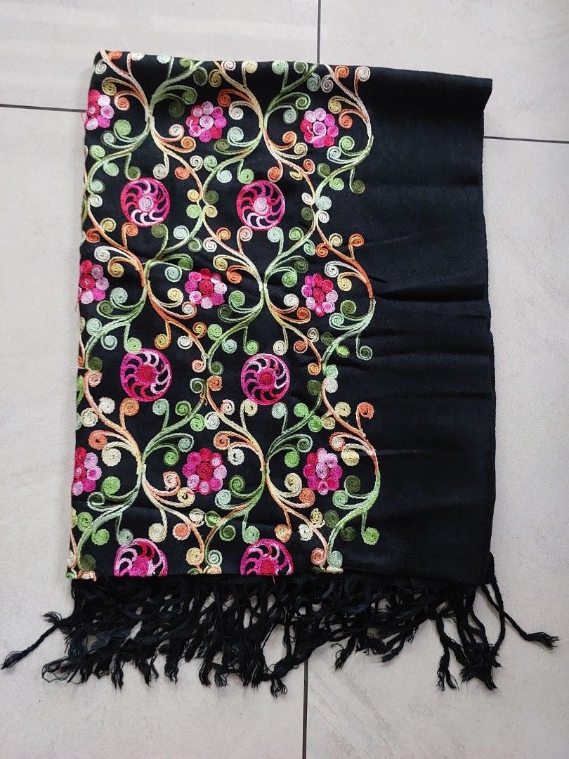 Black Embroidered Shawl with Tassels (Category: Scarves) located in Caloocan City. Submitted by ericajane_tc (Listing ID 1461411272, Image 1). Description: - Black scarf with vibrant floral embroidery along the edges. - Finished with stylish fringed tassels. Size: 68 inch x 27 inch.