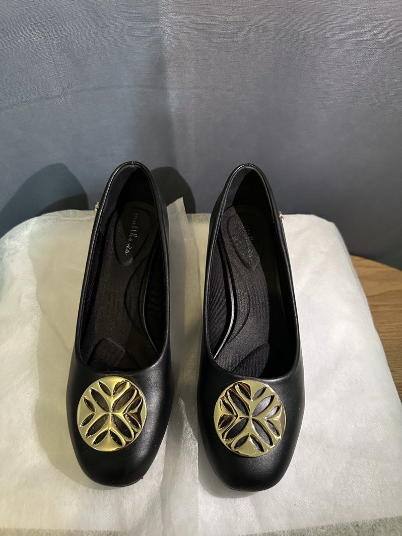 Black Heels (Category: Heels) located in Manila. Submitted by zarahzaraantig (Listing ID 1461458509, Image 1). Description: - Brand: Matthews - Type: Black Block Heels - Size: 37 - Features: Gold emblem on the front - Comfort: Comfortable for everyday wear - Versatile: Perfect for work or casual outings - Condition: Please check photos for details.