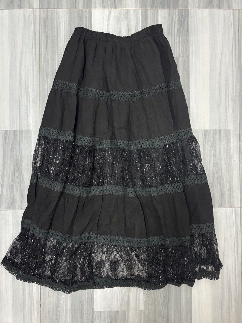 Black Lace Maxi Skirt (Category: Skirts) located in Manila. Submitted by lovedbynabix (Listing ID 1461450993, Image 1). Description: - Long black skirt with elegant tiered layers - Features delicate lace inserts with a subtle shimmer - Crochet trim beautifully separates each tier - Comfortable elastic waistband for a perfect fit - Effortlessly transitions from casual to dressed-up styles - Super easy to mix and match with your wardrobe.