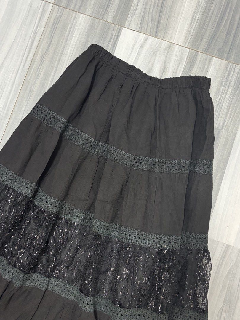 Black Lace Maxi Skirt (Category: Skirts) located in Manila. Submitted by lovedbynabix (Listing ID 1461450993, Image 3). Description: - Long black skirt with elegant tiered layers - Features delicate lace inserts with a subtle shimmer - Crochet trim beautifully separates each tier - Comfortable elastic waistband for a perfect fit - Effortlessly transitions from casual to dressed-up styles - Super easy to mix and match with your wardrobe.