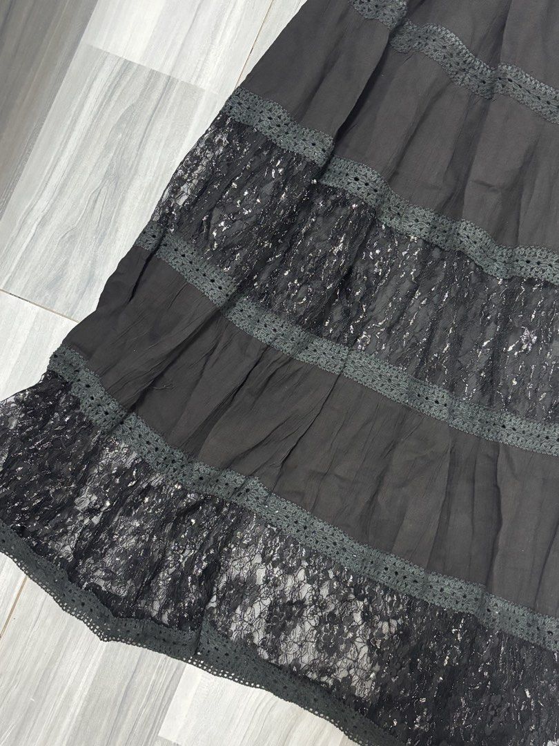 Black Lace Maxi Skirt (Category: Skirts) located in Manila. Submitted by lovedbynabix (Listing ID 1461450993, Image 2). Description: - Long black skirt with elegant tiered layers - Features delicate lace inserts with a subtle shimmer - Crochet trim beautifully separates each tier - Comfortable elastic waistband for a perfect fit - Effortlessly transitions from casual to dressed-up styles - Super easy to mix and match with your wardrobe.