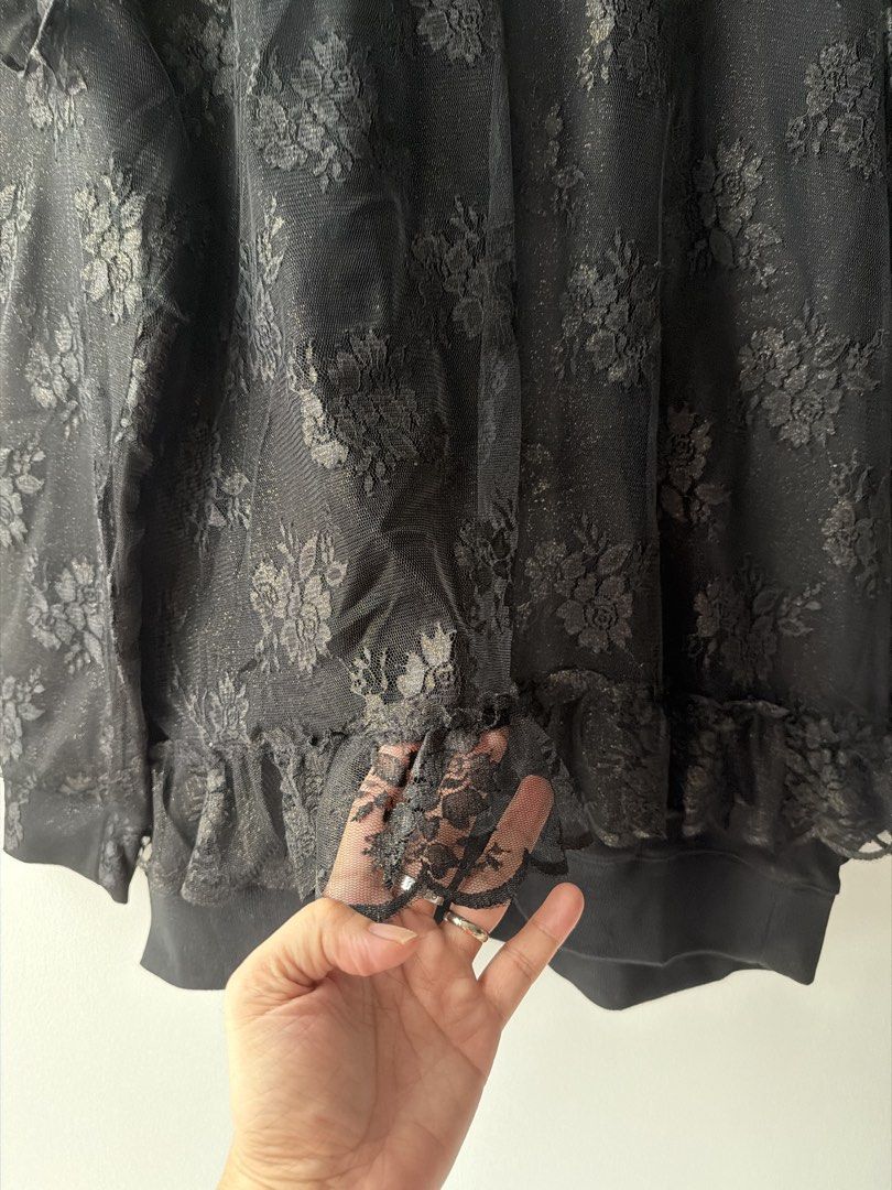 Black Lace Turtleneck Top with Ruffle Details Oversize (Category: Coats, Jackets and Outerwear) located in Makati City. Submitted by cheapipie (Listing ID 1461430217, Image 2). Description: -J KOO fall winter collection 2016 Vintage retails $245. - Elegant black lace turtleneck top - Beautiful all-over floral pattern - Stylish ruffle details on sleeves and hem - Versatile: great for layering or wearing on its own - Chest measurement: approximatel