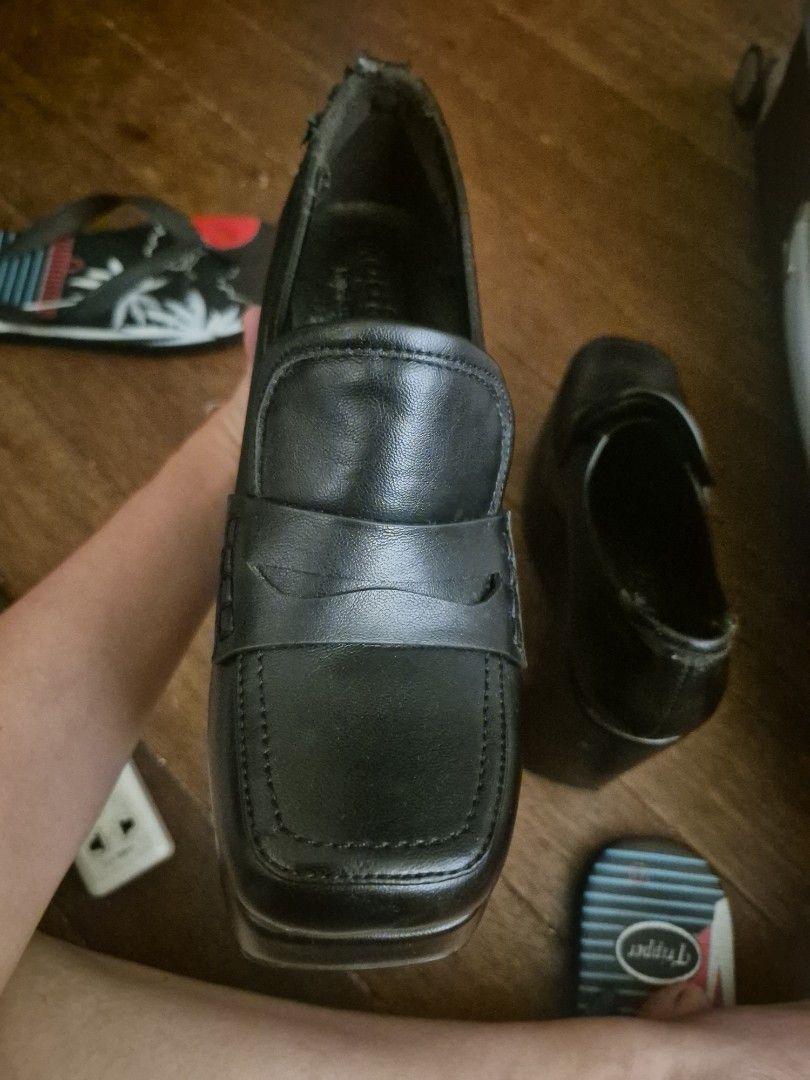 Black Leather Platform Wedge Shoes (Category: Wedges) located in Manila. Submitted by ririmeca (Listing ID 1461348391, Image 3). Description: - Black leather wedge shoes - Square toe design with a strap across the top - Chunky platform wedge heel - Lining around the opening is peeling and worn - Soles are in decent condition - Great for a statement look.