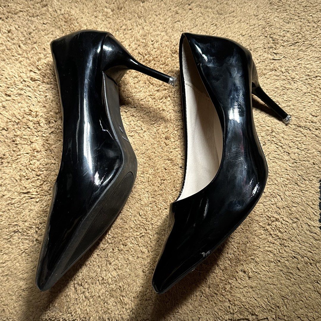 Black Patent Pointed Toe Stiletto Heels (Category: Heels) located in Pasacao. Submitted by eommacollections_ (Listing ID 1461474801, Image 2). Description: - Classic black patent heels - Elegant pointed toe design - Flattering stiletto heel - Versatile for dressing up or down - Minor scuffs on inner lining.
