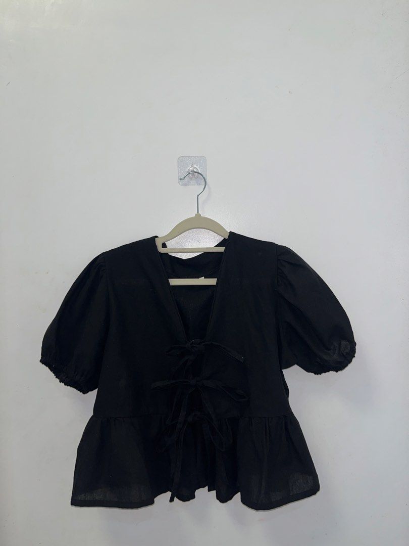 Black Peplum Puff Sleeve Top with Tie Front (Category: Blouses) located in Binmaley. Submitted by thegirlscloset1 (Listing ID 1461499845, Image 1). Description: Cute black peplum top with puff sleeves and tie front. Short, gathered sleeves. Versatile for casual or dressy outfits..