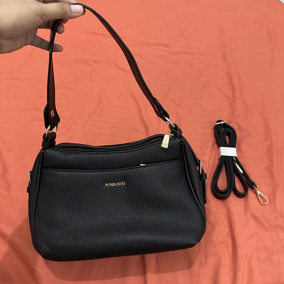 Black shoulder sling bag (Category: Shoulder Bags) located in Caloocan City. Submitted by romeosierra (Listing ID 1461326411, Image 1). Description: still brand new. Hindi po ito nagamit, natanggalan lang ng tags. Pls see photo for original price.