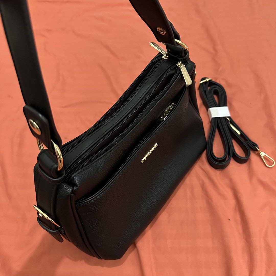 Black shoulder sling bag (Category: Shoulder Bags) located in Caloocan City. Submitted by romeosierra (Listing ID 1461326411, Image 3). Description: still brand new. Hindi po ito nagamit, natanggalan lang ng tags. Pls see photo for original price.