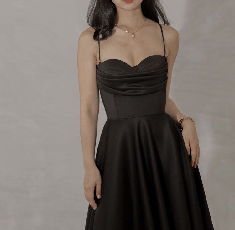 Black Spaghetti Strap Corset Midi Dress (Category: Dresses) located in Caloocan City. Submitted by _happeeshop (Listing ID 1461502782, Image 1). Description: - Elegant black midi dress - Delicate spaghetti straps - Full and flowy skirt - Perfect for special events or a night out - once used for world teacher’s day party - Please check the size guide for accurate measurements for 3rd pic -bought in tiktok see last pic for original price.