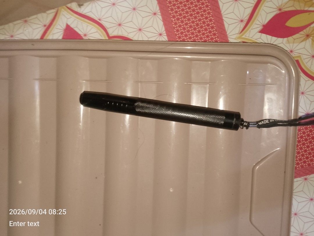 Black Telescopic Baton with Pouch (Category: Musical Instruments) located in Manila. Submitted by chollo24 (Listing ID 1461326775, Image 2). Description: - Black telescopic baton - Extends to full length - Includes fabric pouch for storage - Textured grip handle - Ideal for self-defense or collection - Please check photos for detailed condition.