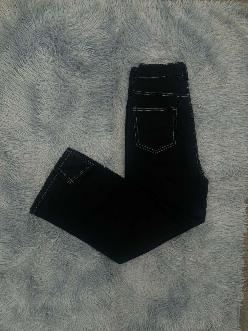Black Wide Leg Jeans with White Stitching (Category: Jeans) located in Lianga. Submitted by arwthrifts (Listing ID 1461467883, Image 3). Description: - Black wide leg jeans - Features contrast white stitching throughout - High-waisted fit - Classic five-pocket styling - Button and zip closure - Great for casual wear - Versatile wardrobe piece.