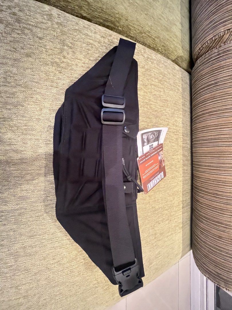 Blackhawk! Black Tactical Sling Bag (Category: Sling Bags) located in Subic. Submitted by malojod2334612 (Listing ID 1461390305, Image 2). Description: - Brand: Blackhawk! - Type: Tactical Sling Bag - Color: Black - Strap: Adjustable with buckle closure - Features: Multiple pockets and compartments for organization - Durability: Made with durable material - Use Cases: Great for everyday carry or outdoor activities - Origin: Made in Vietnam.
