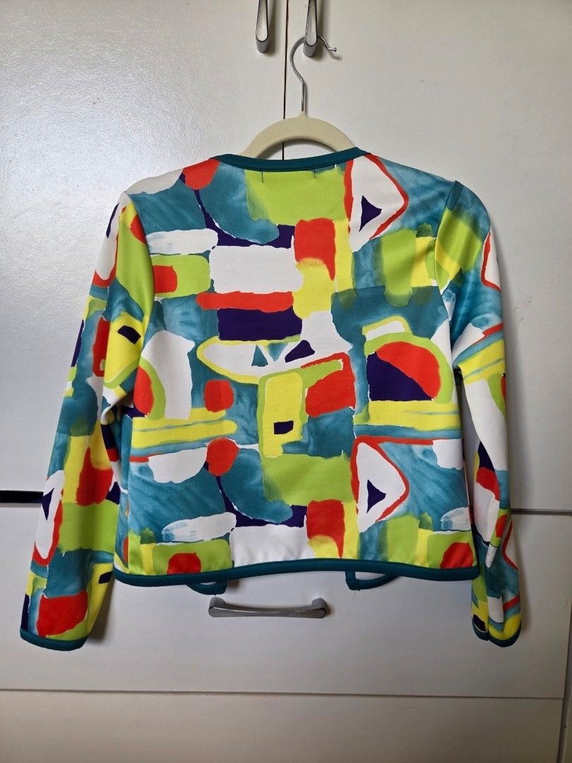 Blazer (Category: Coats, Jackets and Outerwear) located in Agdangan. Submitted by wearitnext.shop (Listing ID 1461452875, Image 3). Description: Open-front, collarless jacket with vibrant geometric print with watercolor-like textures. Medium to Large.