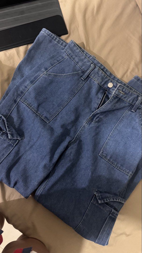 Blue Denim Cargo Pants (Category: Jeans) located in Manila. Submitted by flyingyvon (Listing ID 1461522608, Image 2). Description: - Classic blue denim cargo pants - Multiple pockets for ample storage - Zipper fly with button closure .